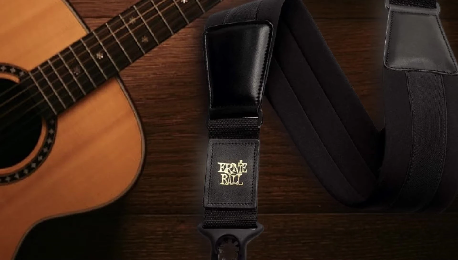 Demonstrating ease of installation of the Ernie Ball strap