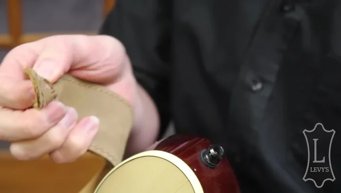 Repeat the process for the other strap button.