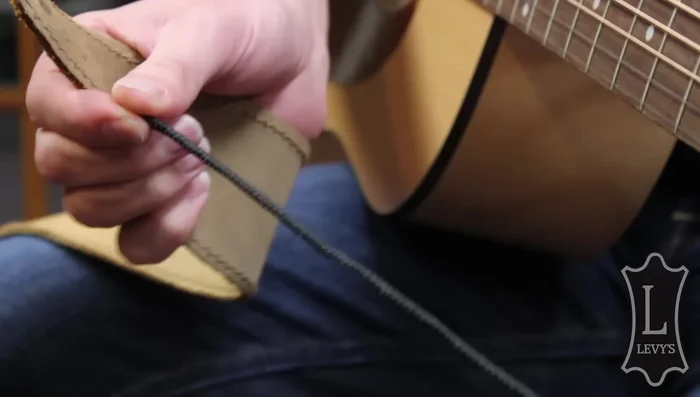 Fold the shoelace in half.