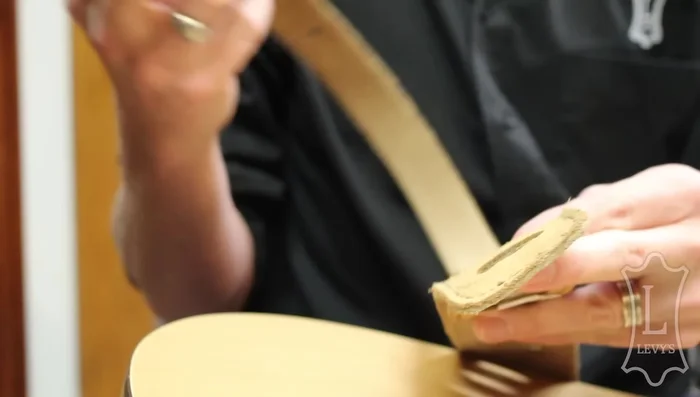 Push the feed through back through the next slot in line.