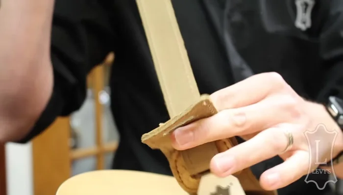 Give it a tug to secure the strap.