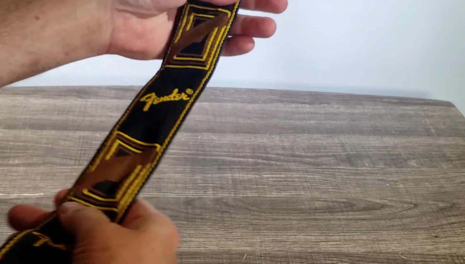 A shot of the reviewer wearing the strap, showing comfort.