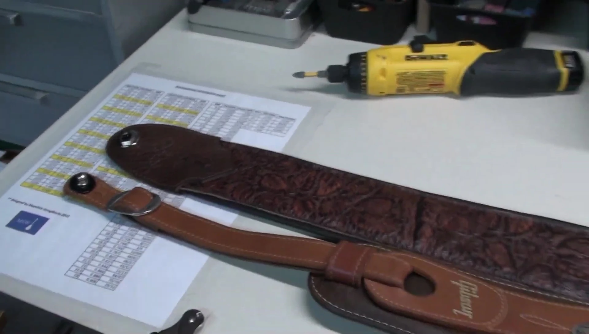 Close-up of the Gibson strap and the other strap side by side.
