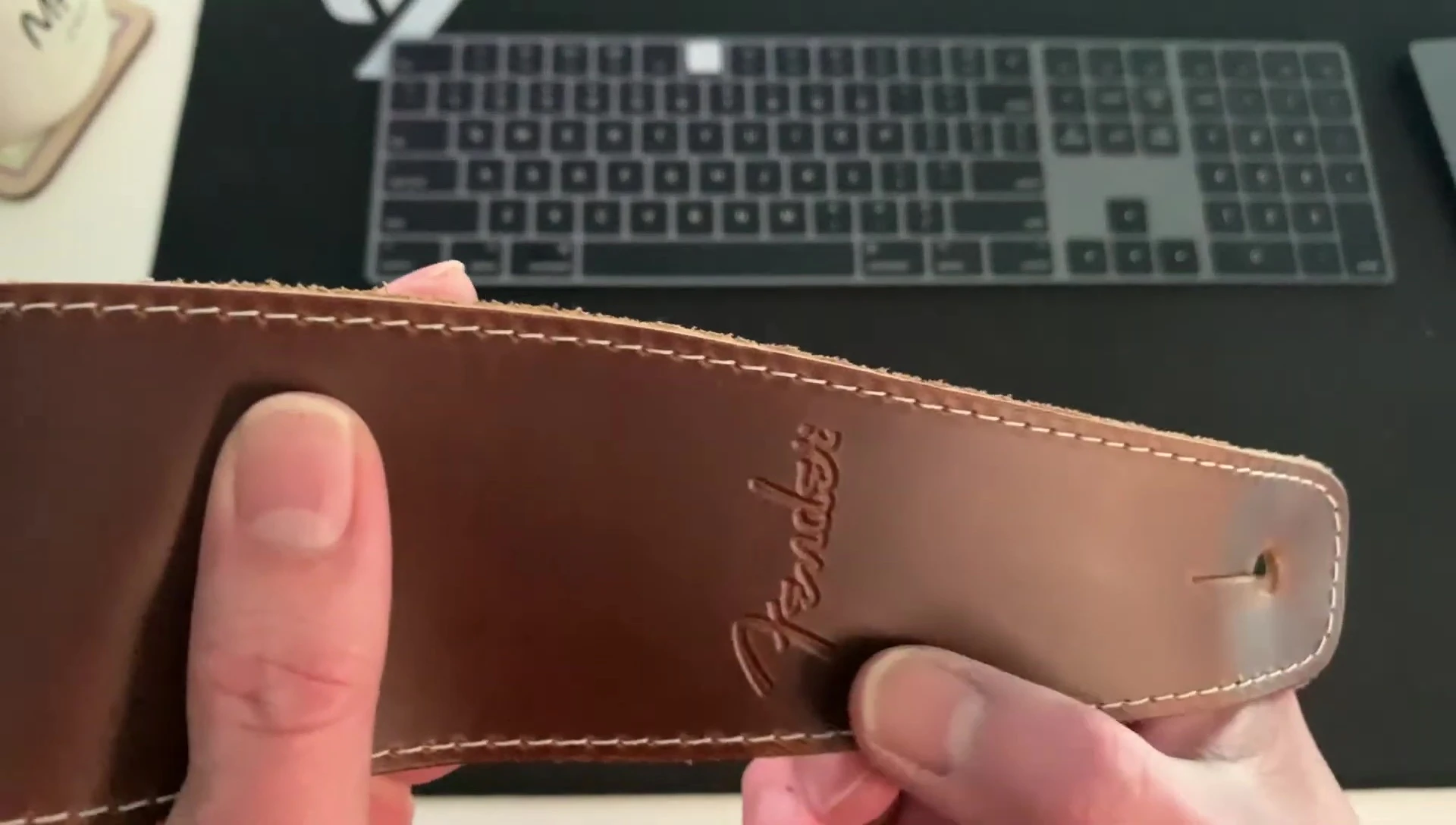 Close-up of the Fender branding and stitching