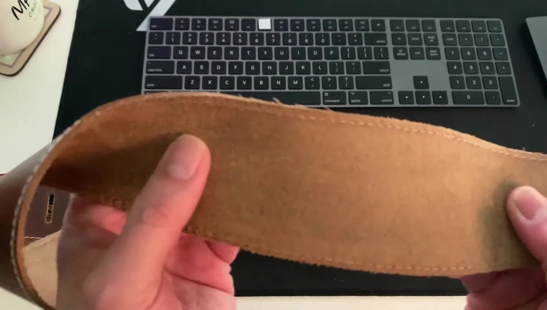 Showing both sides of the leather strap