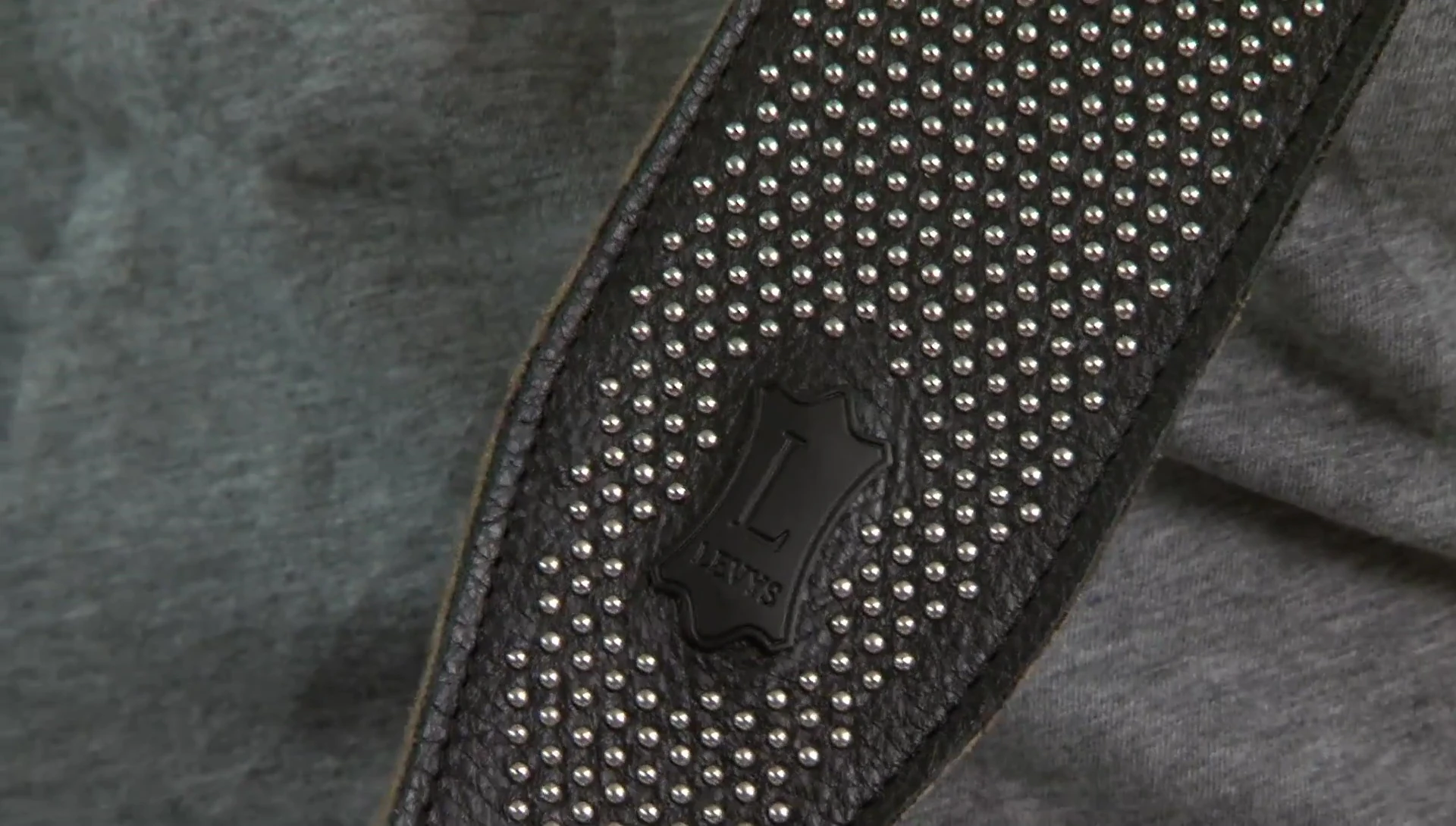 The Nail Head strap showcasing its unique design and nail head embellishments.