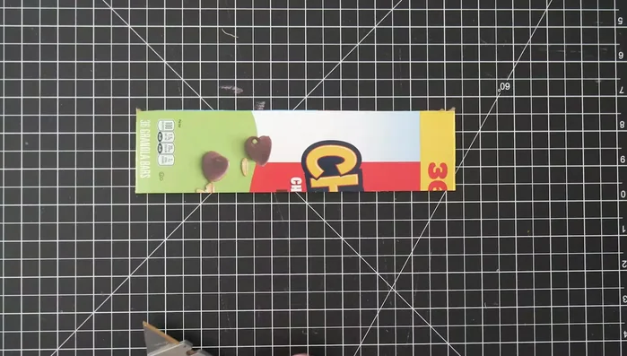 Iron the raw edges inward using a cardboard guide.