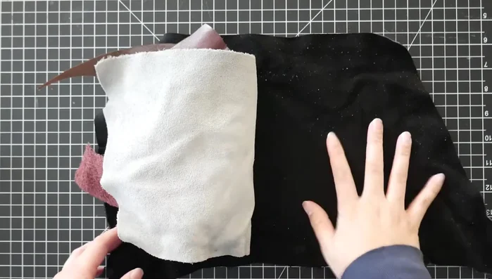 Prepare the leather pieces: Cut out the leather patterns (one large, two small).