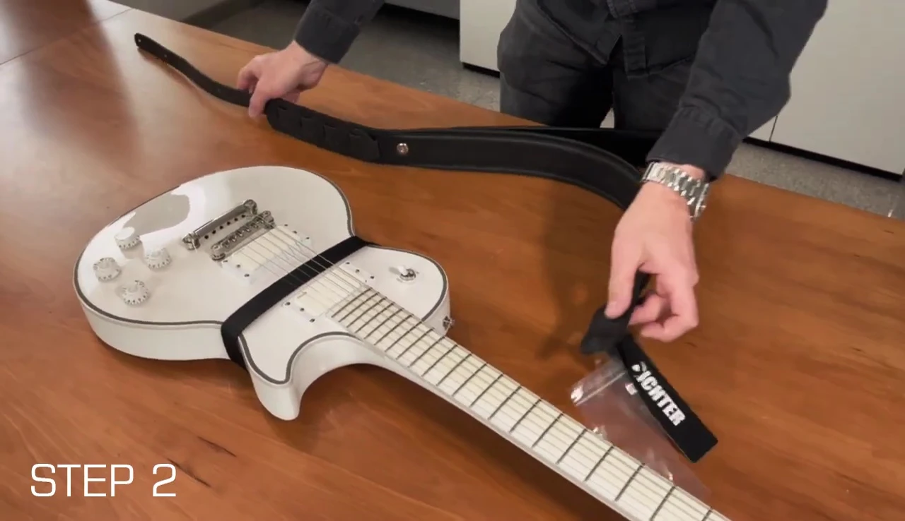 Adjusting the length of the main strap.