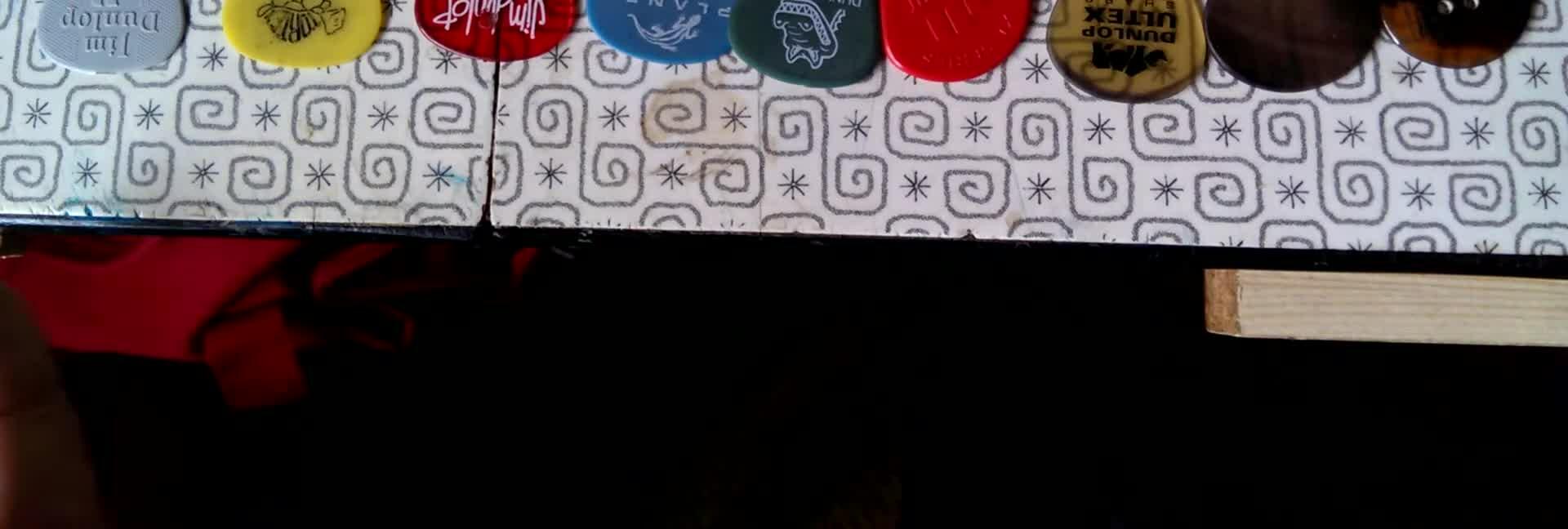 Close-up of Dunlop picks.