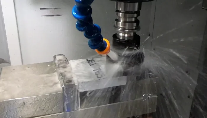 Engrave lettering using a small-diameter engraving bit for detailed features.