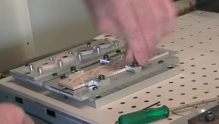 Remove the breakout tabs and sand the edges of the picks with 400 and then 1200 grit sandpaper.