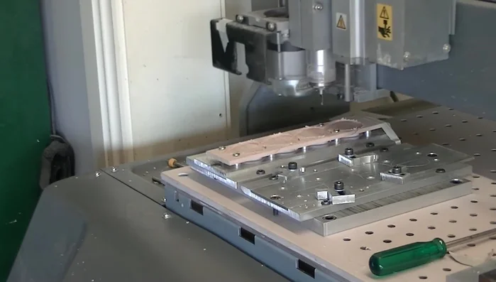 Change the bit to a 0.1mm V-bit and engrave the customer's logo.