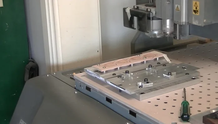 Change the bit to a 1mm end mill and cut out the final shape of the picks.