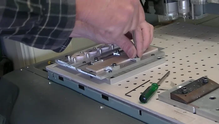 Drill alignment holes using the 3.175mm bit.