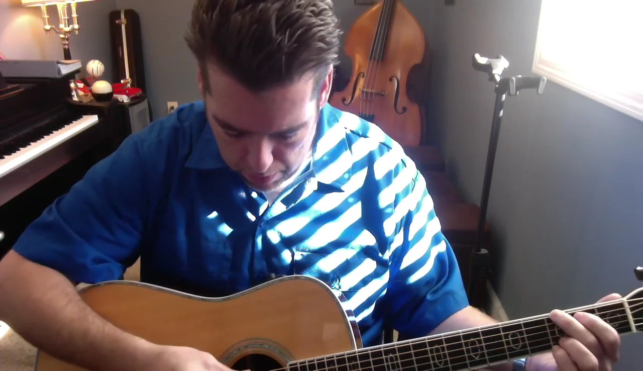 The guitarist playing the John Pierce Fast Turtle pick.