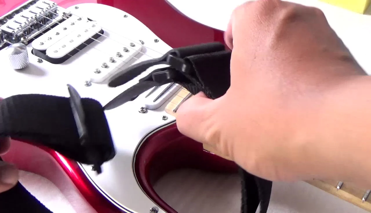 Close-up of the D'Addario polypropylene guitar strap packaging.