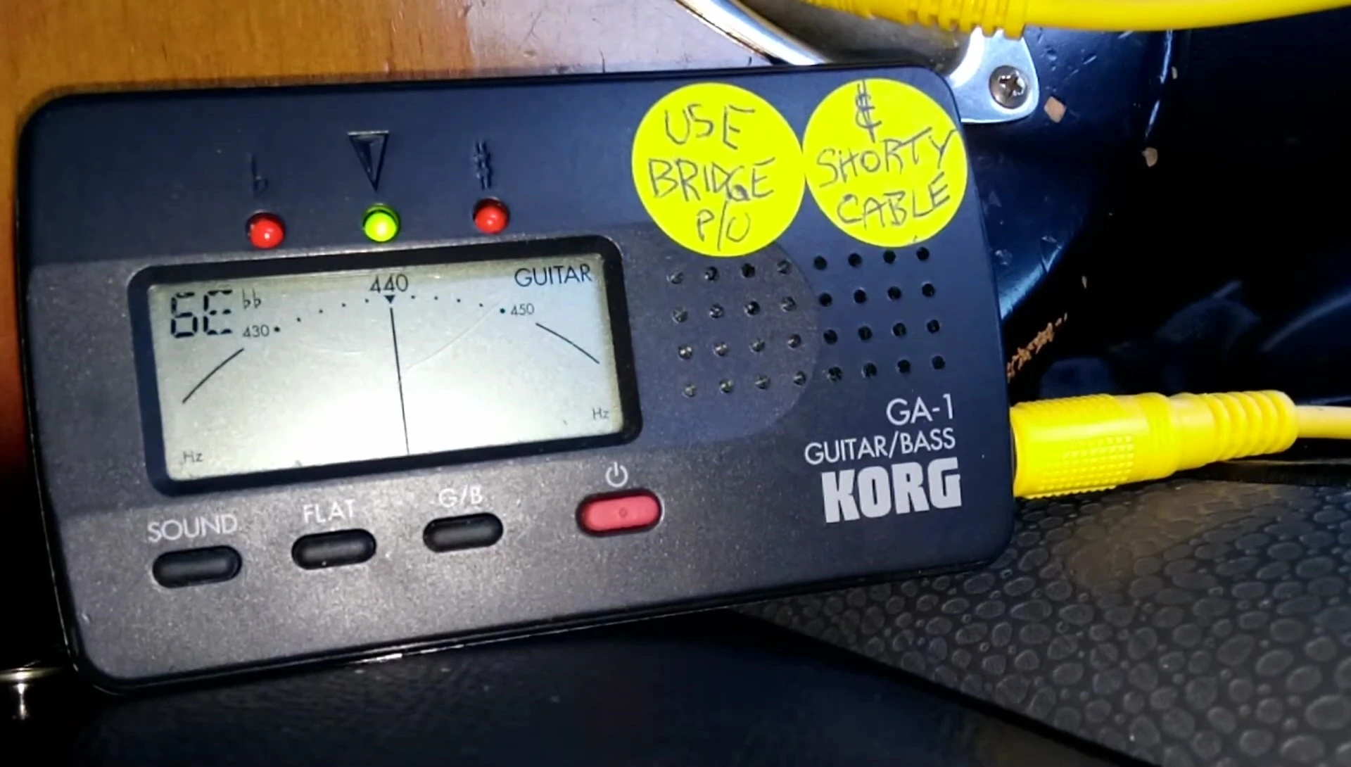 The Korg GA-1 tuner displaying a stable, in-tune reading.