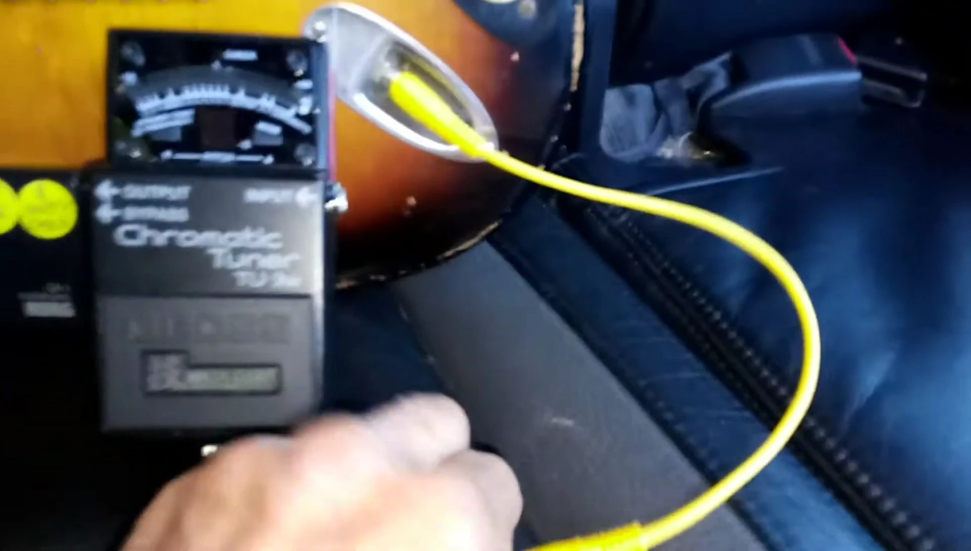 The reviewer demonstrating the short cable used for testing.
