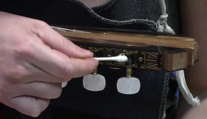 Move the swab/toothpick back and forth to distribute the petroleum jelly.