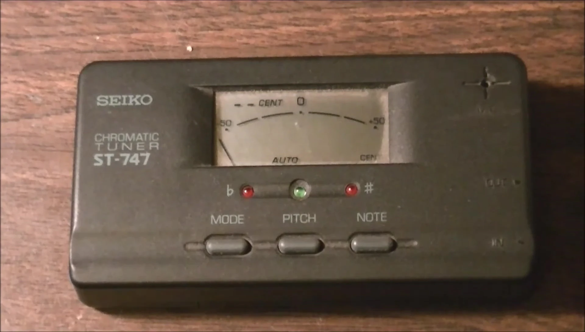 Close-up of the tuner's display and input/output jacks.