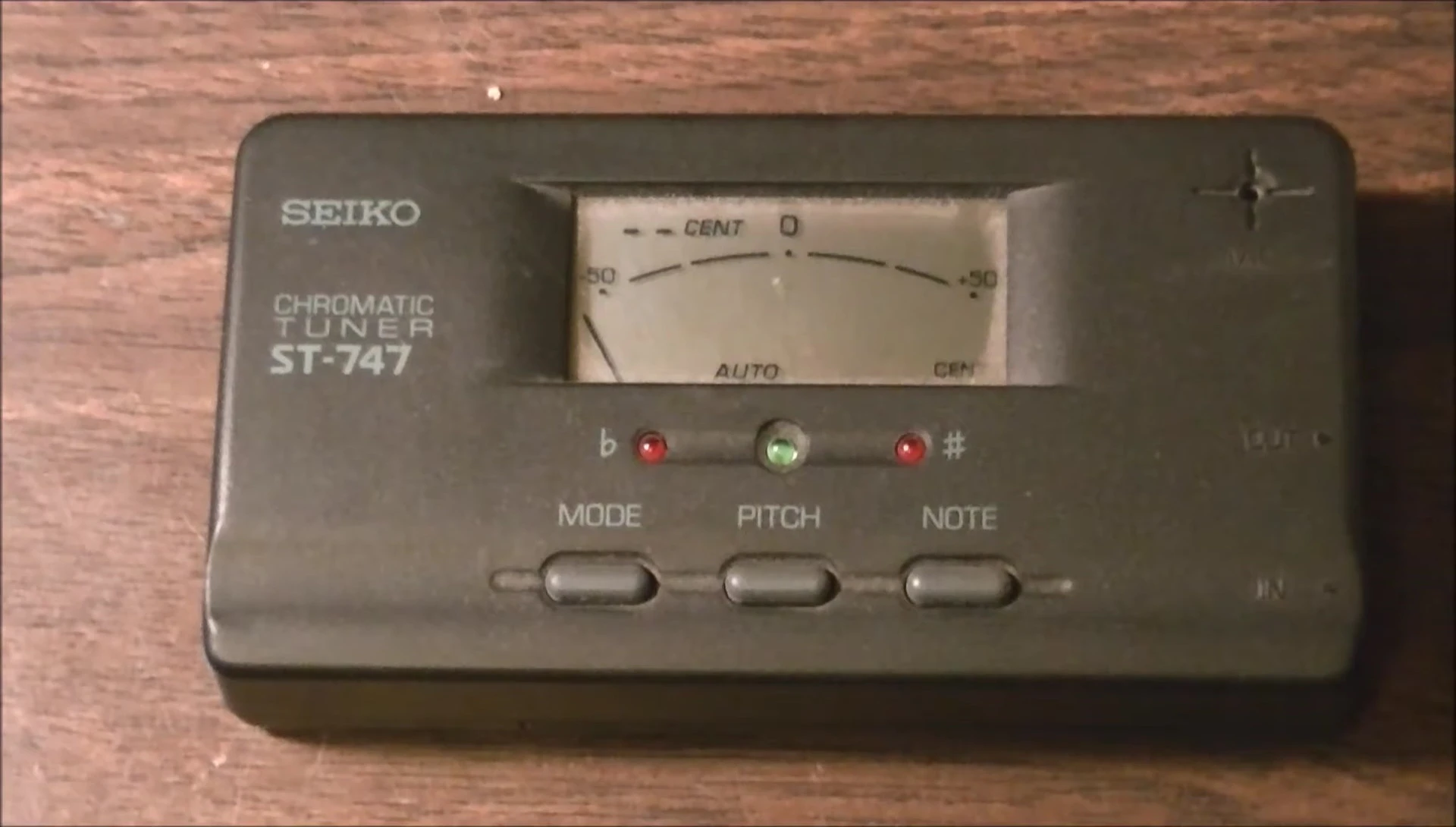 Image showing the Seiko ST-747 tuner and its price range mentioned in the video.
