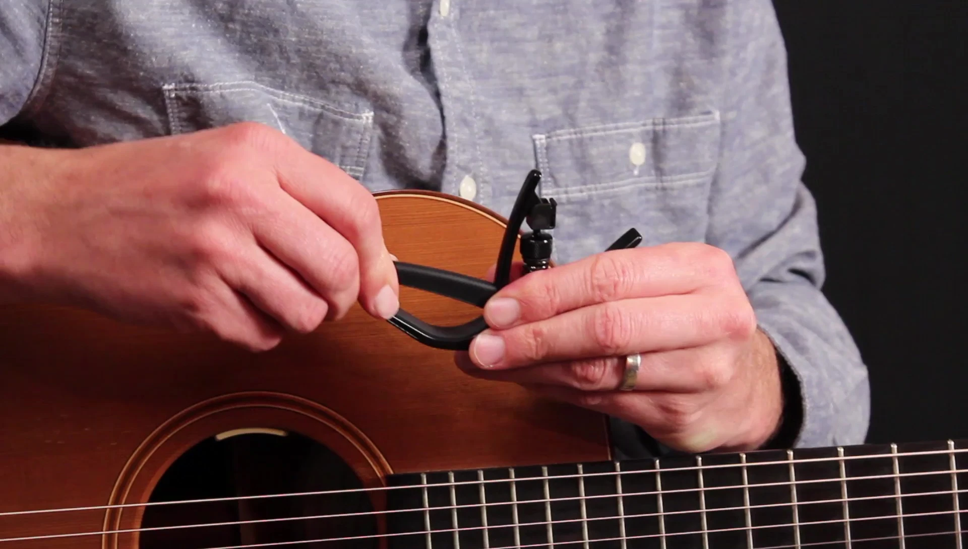 Close-up shot showcasing the rubber padding on the capo