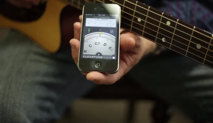 Open the app and position your phone near your guitar.