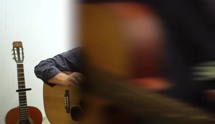 Clip the tuner onto the headstock of your guitar.