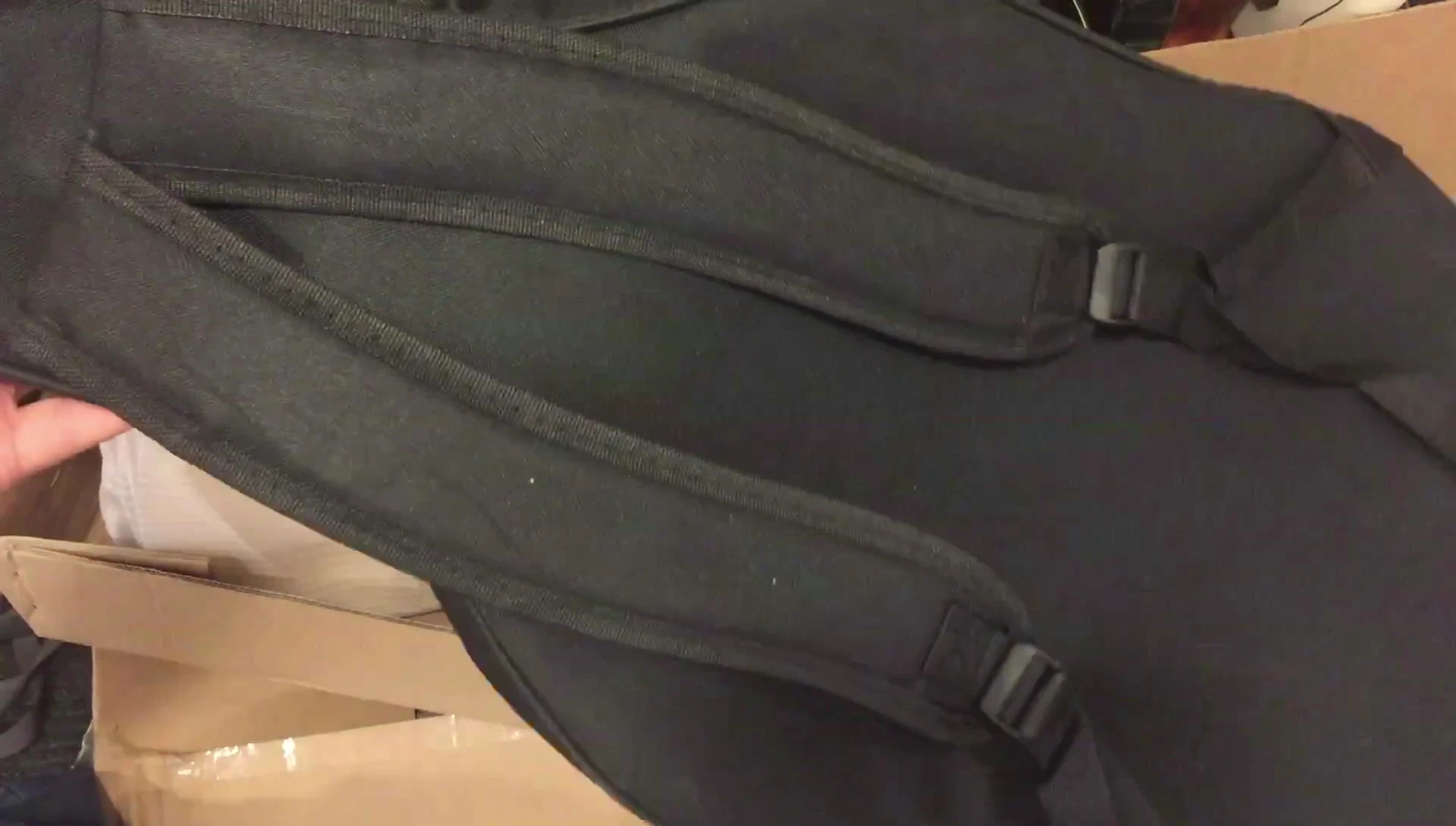 Close-up of the backpack straps on the guitar case.