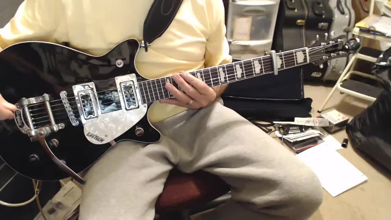 Capo placement halfway across the fret