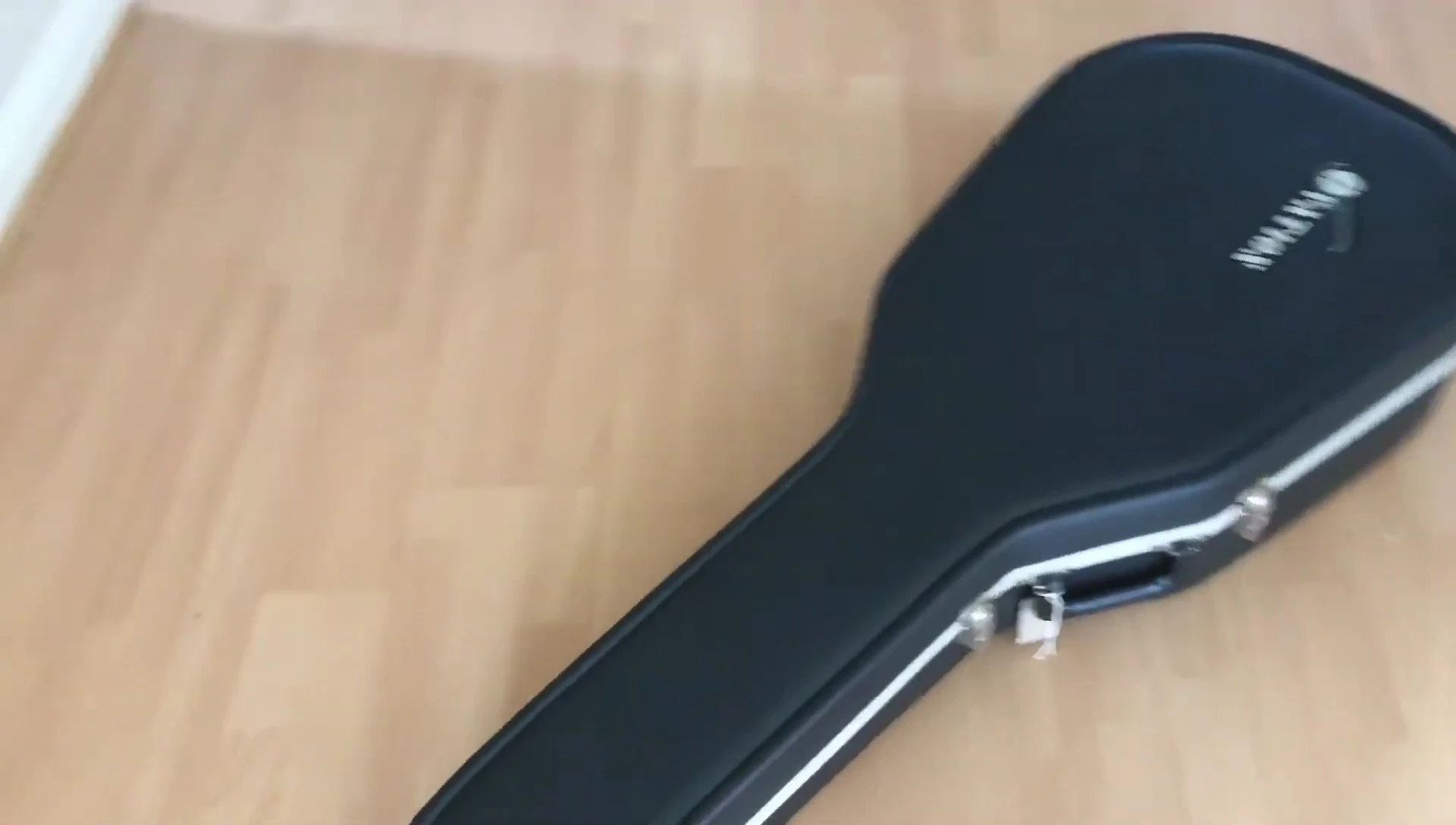 Close-up of the case latches showing signs of rust.