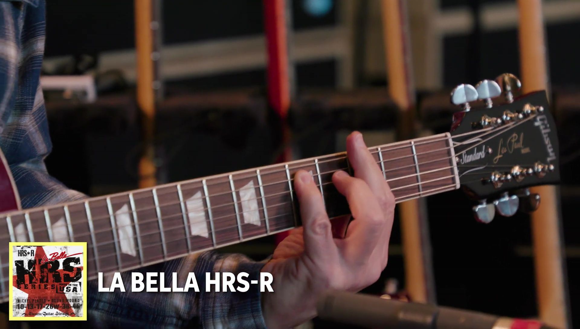 Guitar strings of different brands displayed for the brand comparison.
