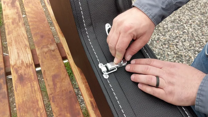 Use a sharpie to mark the location for the top screw on the bottom piece. Flipping the latch down helps align this hole.