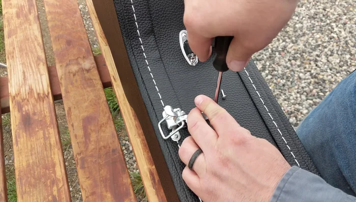 Install the remaining screws on the top piece and bottom piece. Check screw length to prevent them from protruding through the case.