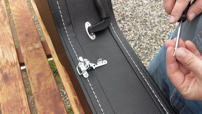 Install the remaining screws on the top piece and bottom piece. Check screw length to prevent them from protruding through the case.