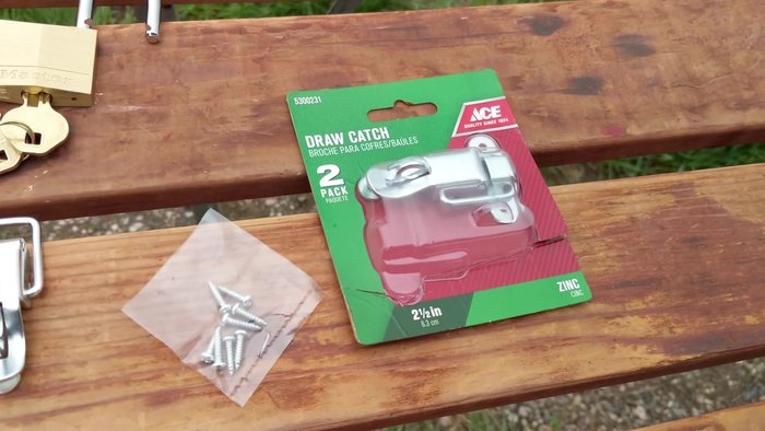 Prepare the case and locking padlocks. Note the original clasps are riveted on. We will install the additional catches in a similar manner.