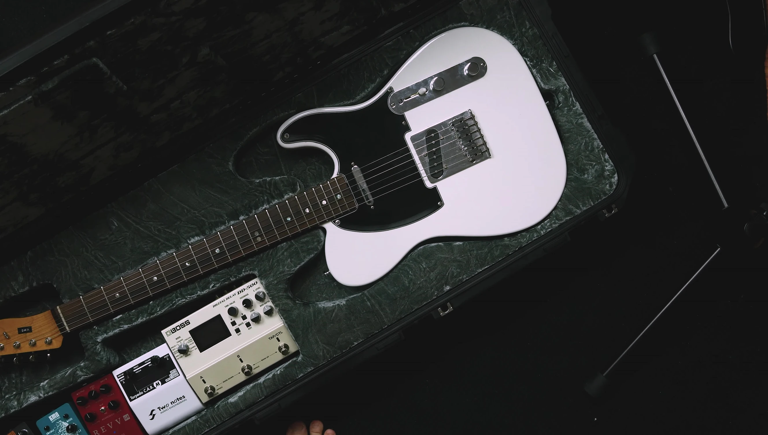 Guitar and accessories securely stored in the case