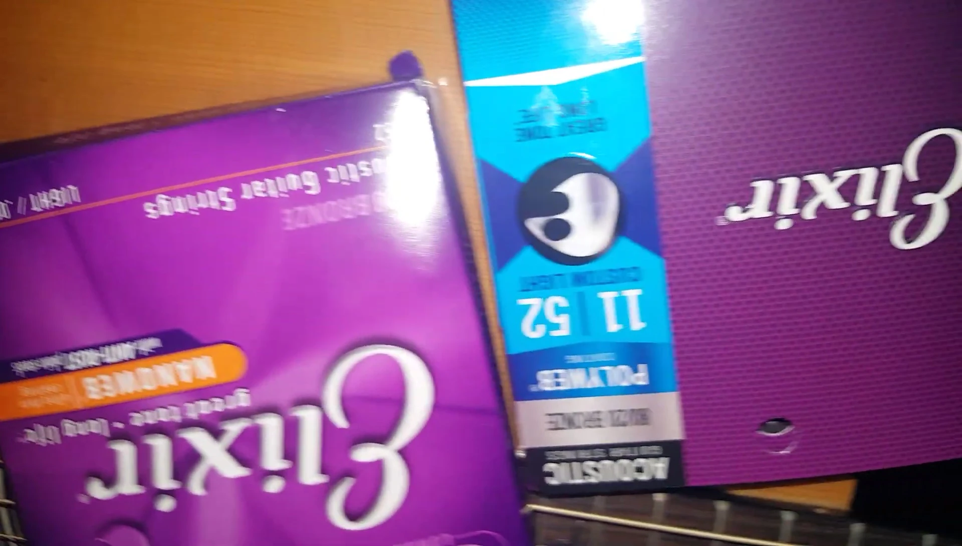 Comparison shot showcasing the gauge difference between the Nanoweb and Polyweb strings.