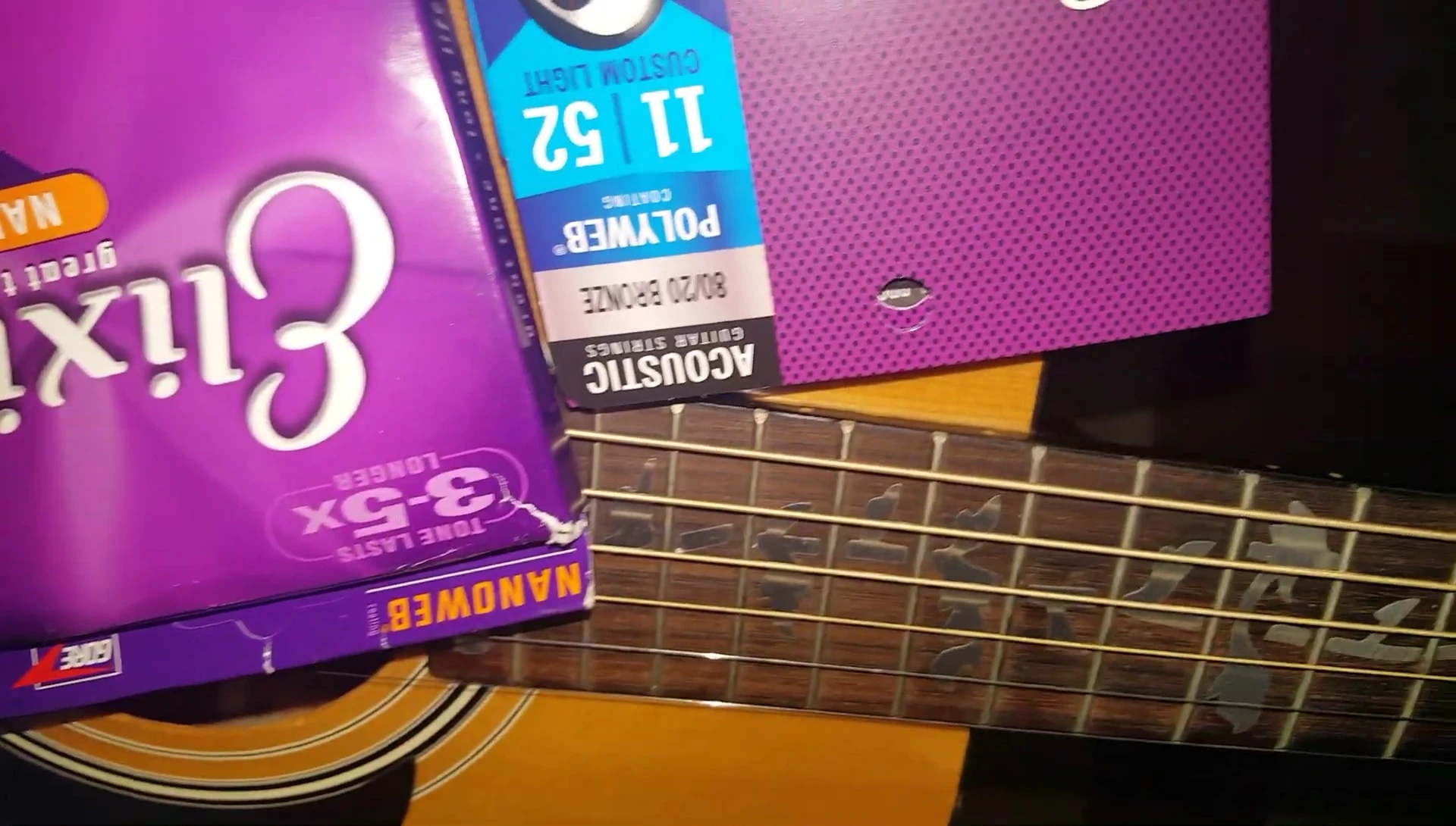Close-up comparison of the coating on the Nanoweb and Polyweb strings