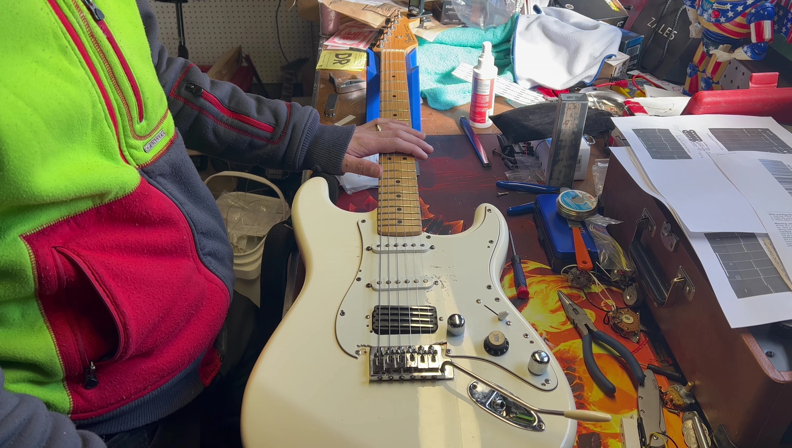 The guitar connected to an amplifier, ready for the sound test