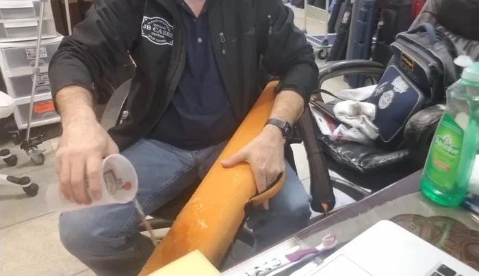 Apply soapy water to the case. Pour water onto the case if desired (backside is waterproof).