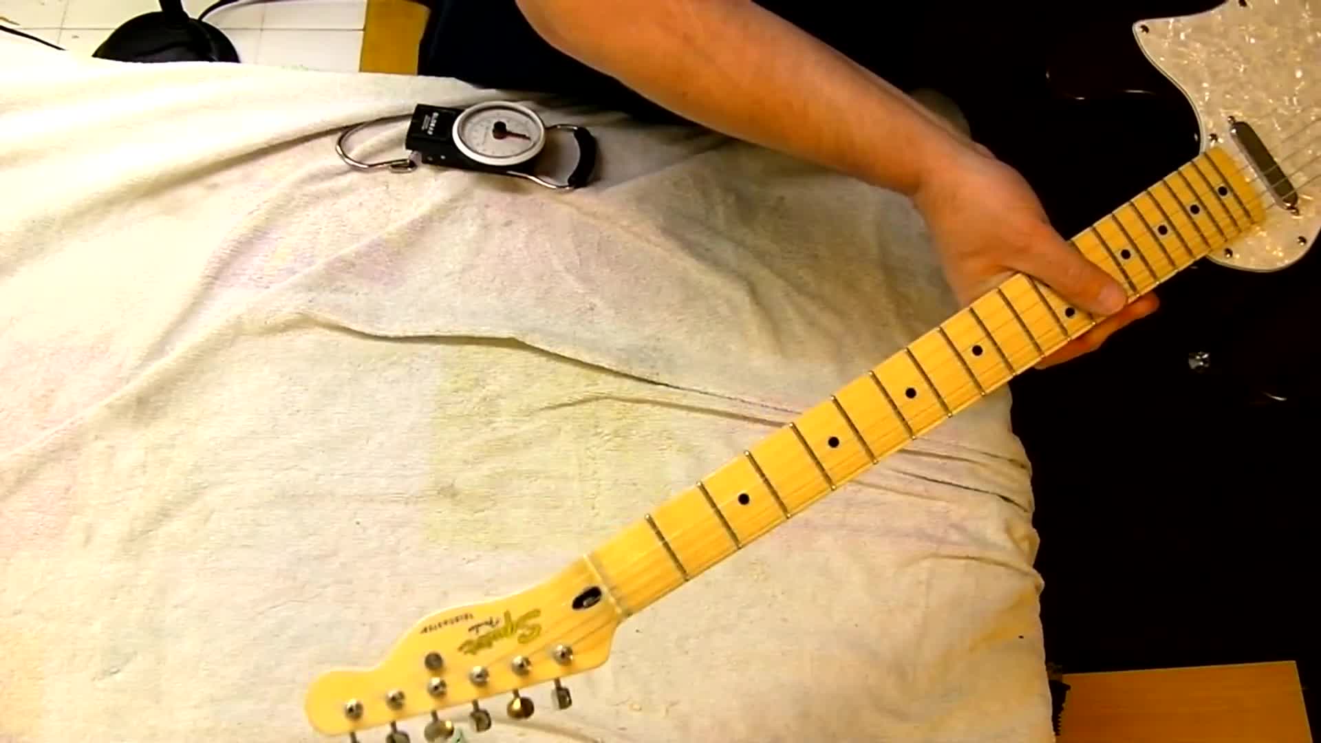 Close-up of the guitar, highlighting the semi-hollow body.