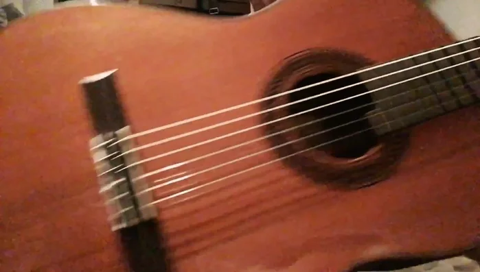 Re-install the strings onto your guitar, maintaining the original winding.