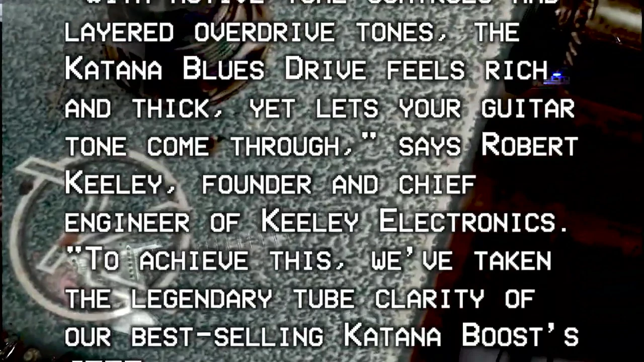Guitarist playing with the Keeley Katana Blues Drive pedal