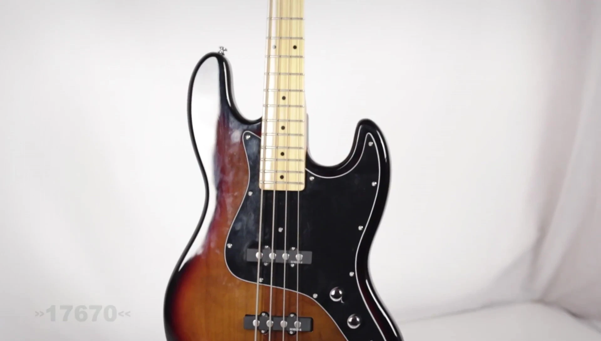 The Memphis Pro hanging guitar stand showcasing its adjustable height and hanging mechanism.