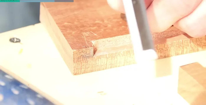 Attach the side pieces with screws; fill, sand, and finish the screw holes.