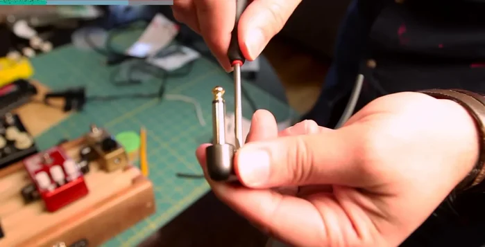 Attach the handle and assemble the D'Addario cable kit for a custom cable setup.