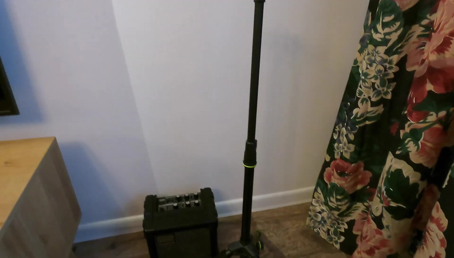 Placing the guitar onto the stand