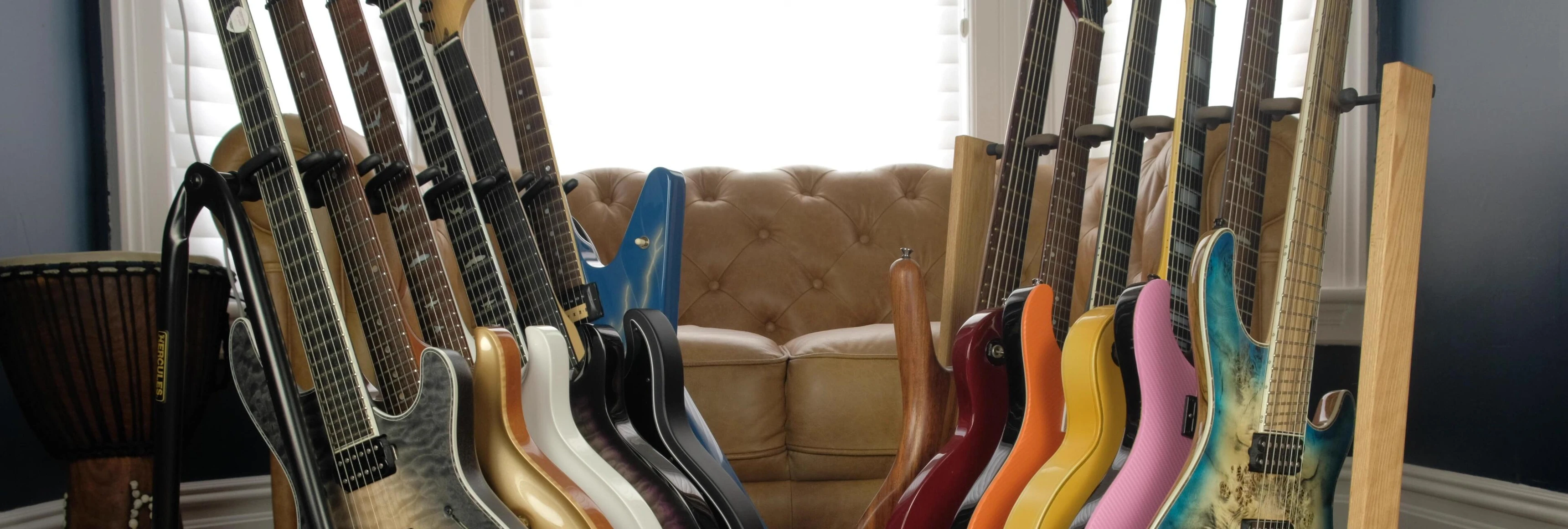 Dimensions of the String Swing guitar rack are displayed.